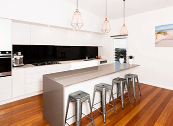 Kitchen With Bar Stools — Builders in Hunter Valley, NSW