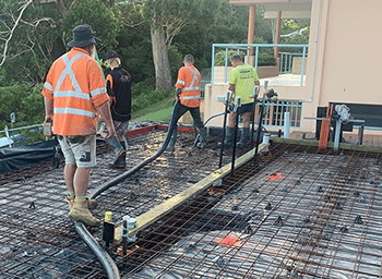 Construction Workers Building House Slab — Builders in Newcastle, NSW