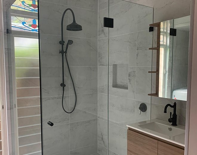 Bathroom With Marble Tiles — Builders in Hunter Valley, NSW